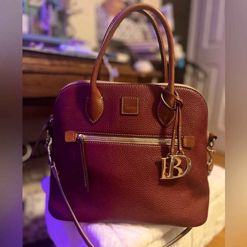 Rooney and Burke pebble grain domed satchel in red.